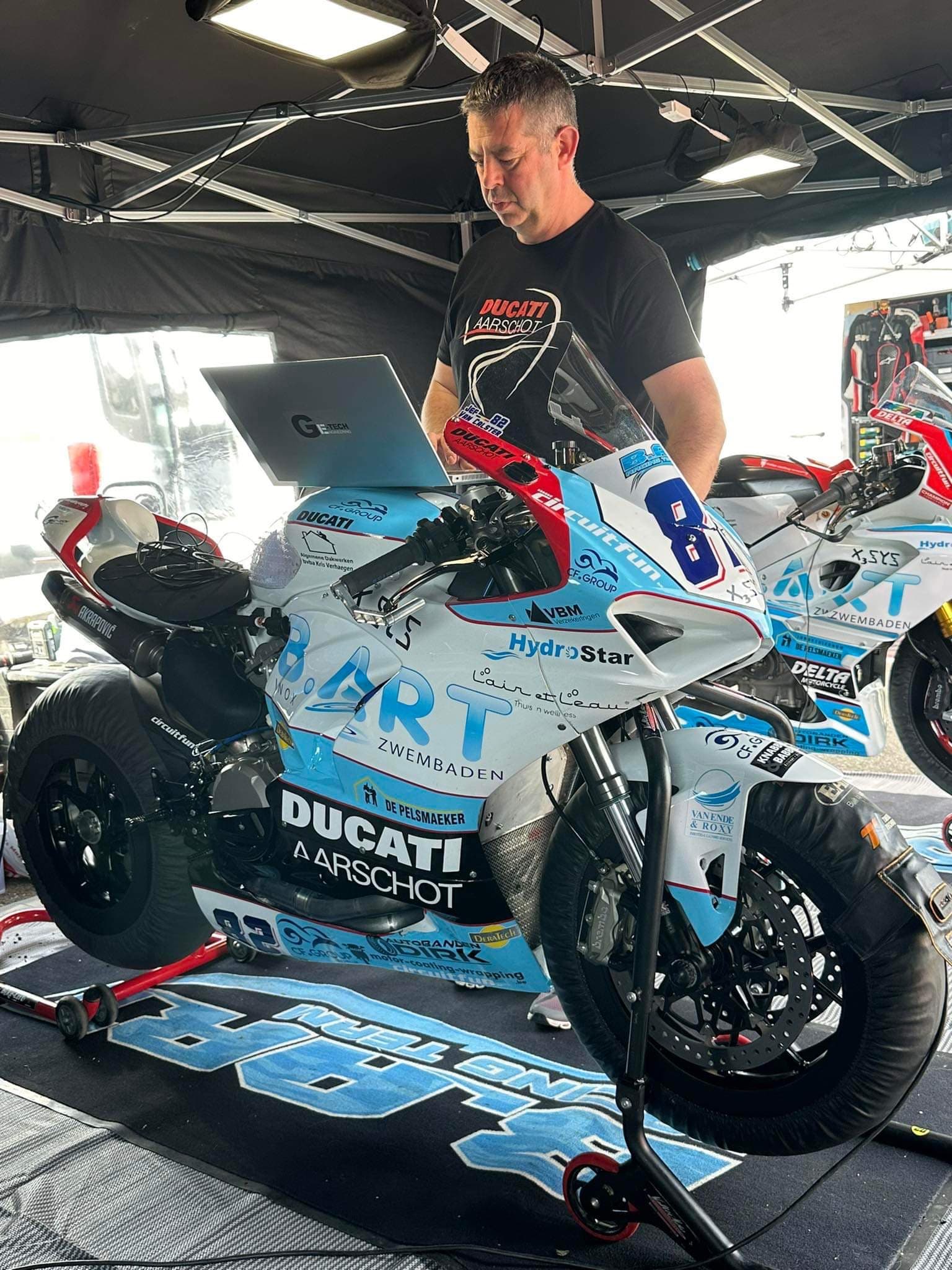 Ge-Tech Engineering trackside in the pit garage, working on a Ducati race bike setup